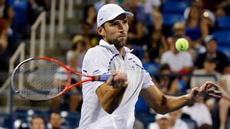 Karlovic beats Berdych in first round at Qatar Open tennis tournament