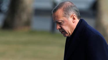 Turkey's Prime Minister Tayyip Erdogan arrives at the cabinet meeting in Ankara December 30, 2013. 