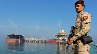An Iraqi soldier stands guard near the Central Metering and Manifold platform (CMMP) at Al Basra oil terminal in the Middle East Gulf November 27, 2013. T