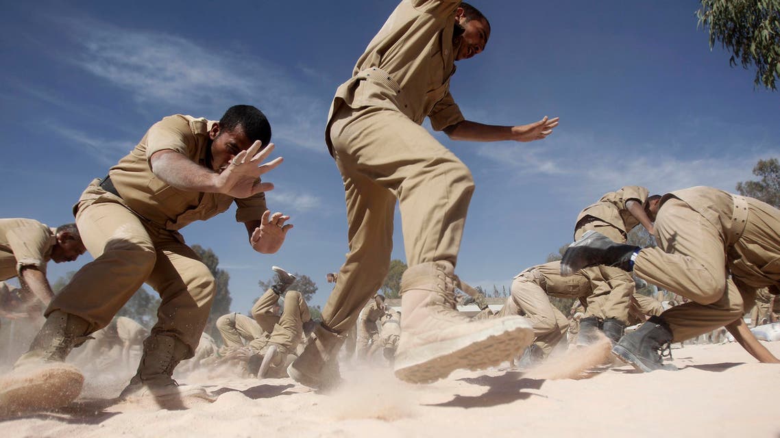 Newly recruited members of the Yemeni military police force participate in exercises at their barracks in Sanaa January 8, 2014