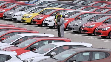 Renault cars produced in Turkey and awaiting export throughout Europe, are checked by workers in the port of Koper October 14, 2013. reuters