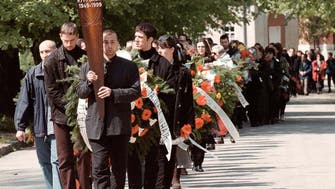 Serbia arrests two ex-spies over journalist’s murder 