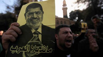 Islamist Mursi, secularists charged in new case
