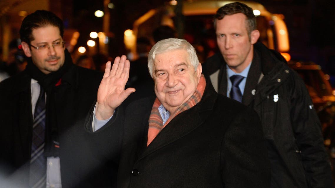 Syrian Foreign Minister Walid Muallem (C) gestures upon his arrival on Jan. 21, 2014 on the eve of the so-called “Geneva II” peace talks in Montreux. (Reuters)
