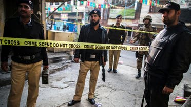 Security officials cordon off the site of a suicide blast in Rawalpini January 20, 2014. 