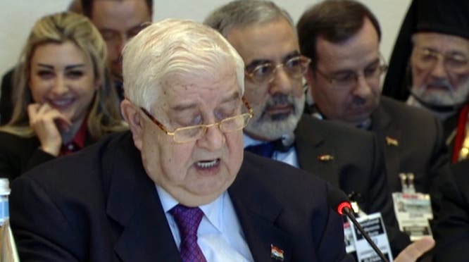 لونا الشبل وعمران الزعبي خلف وليد المعلم في جنيف 2