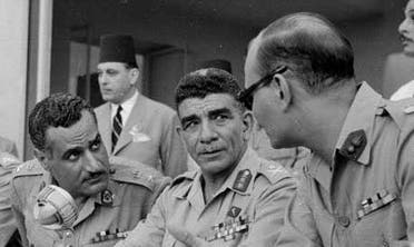Mohammad Naguib (C) and Nasser (L) pictured here shortly after the Free Officers took power in 1952 (File photo: Reuters)