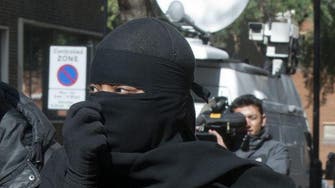 Defiant Muslim woman on trial in Britain refuses to remove niqab
