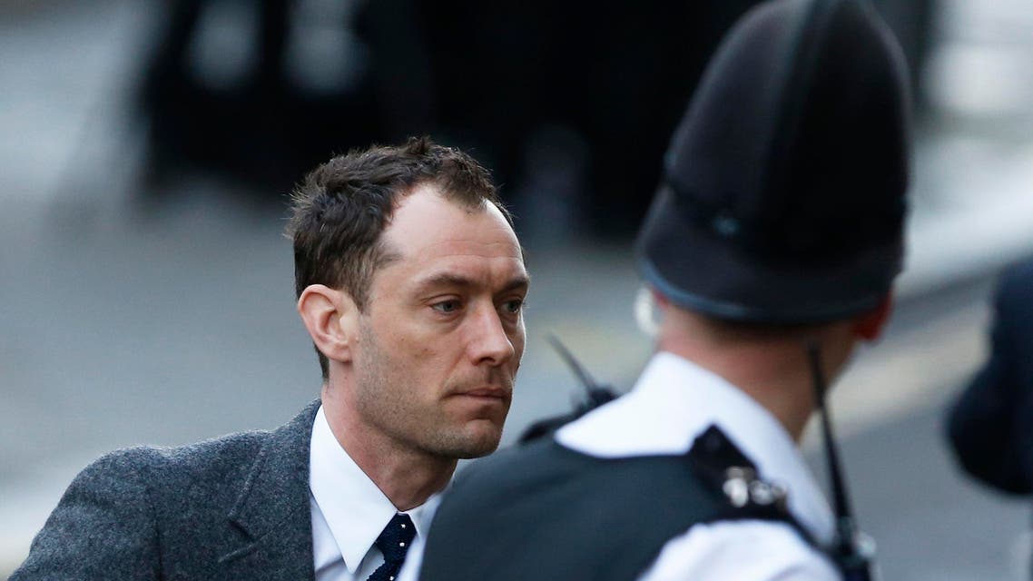 Actor Jude Law arrives to give evidence at the Old Bailey courthouse in London on Jan. 27, 2014. (Reuters)