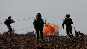 Ten Palestinians shot in West Bank, medics say