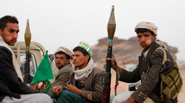 Armed followers of Yemen's Shi'ite Houthi group sit on a truck patrolling the vicinity of a ceremony attended by fellow Shi'ites in Dhahian of the northwestern Yemeni province of Saada Feb. 3, 2012. (Reuters)
