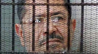 جنايات القاهرة تؤجل محاكمة مرسي لسوء الأحوال الجوية