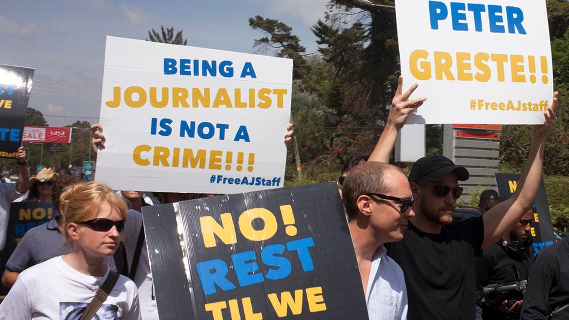 Journalists participate in a protest demanding the release of four Al Jazeera correspondents outside the Egyptian embassy in Kenya’s capital of Nairobi on Feb. 4, 2014. (Reuters)