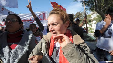 Tunisians marked 12 turbulent months since Belaid was assassinated