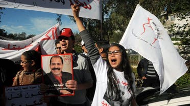 Tunisians marked 12 turbulent months since Belaid was assassinated