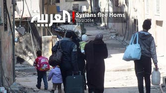 Syrians flee Homs