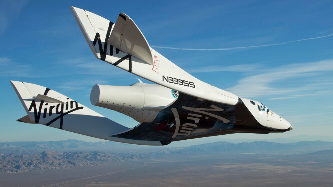 The Virgin Galactic SpaceShip2 (VSS Enterprise) glides toward Earth on its first test flight after being released from its WhiteKnight2 (VMS Eve) mothership over Mojave, California Oct. 10, 2010. (Reuters)