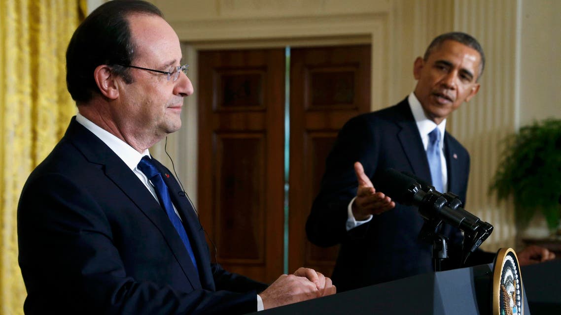 U.S. President Barack Obama (R) and French President Francois Hollande address a joint news conference in the East Room of the White House in Washington, Feb. 11, 2014. (Reuters)