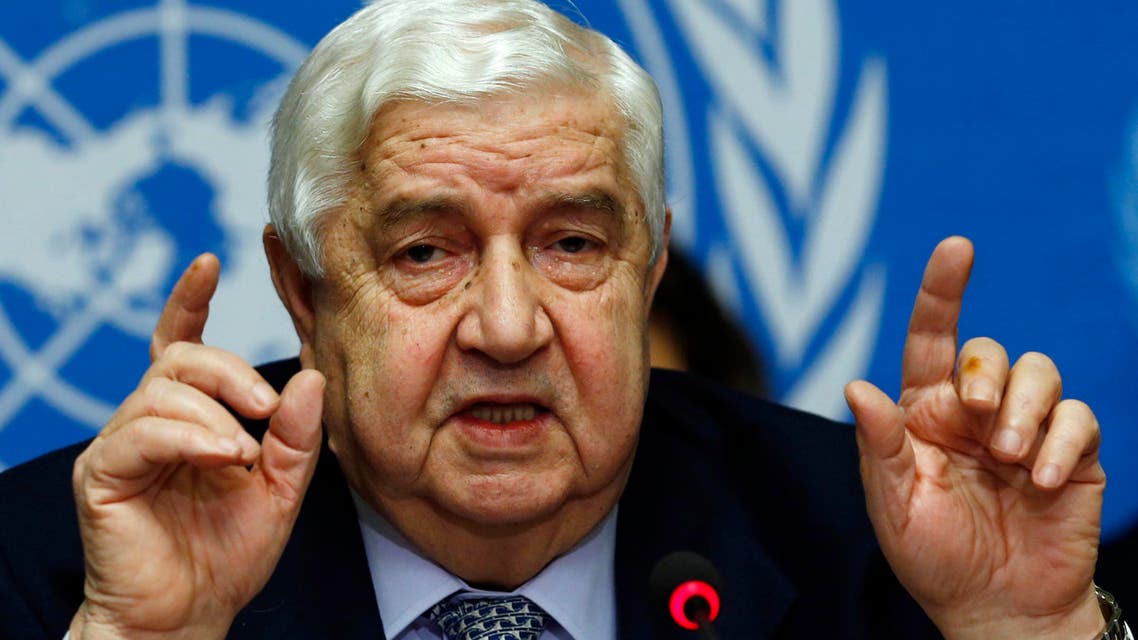 Syria's Foreign Minister Walid al-Moualem gestures as he addresses a news conference at the United Nations European headquarters in Geneva January 31, 2014. reuters