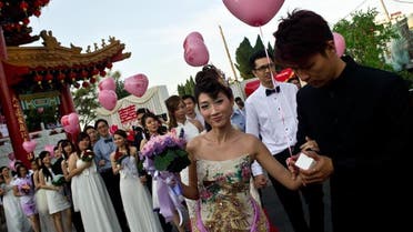 Love birds tie the knot in Malaysia mass wedding
