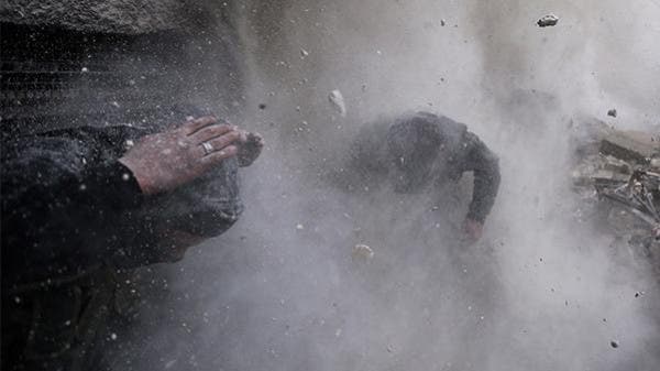 اللقطة الفائزة بجائزة الصورة الاخبارية ضمن مجموعة من 12 صورة من سوريا