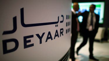 Visitors walk past a Deyaar stand during the Cityscape real estate exhibition in Dubai, Oct. 2, 2012. (File photo: Reuters)