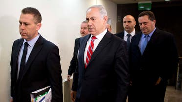  Israel's Prime Minister Benjamin Netanyahu (C) arrives to chair the weekly cabinet meeting on Feb. 16, 2014 in Jerusalem.  (AFP)