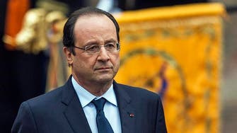 Hollande pays tribute to Muslim soldiers at Paris mosque 