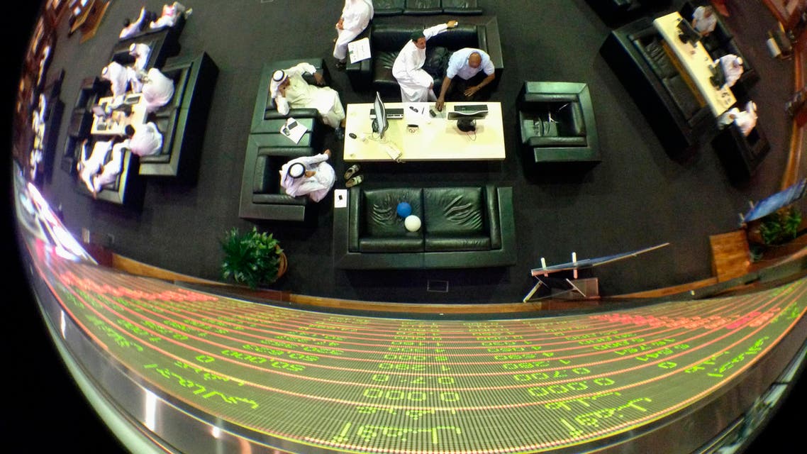 An electronic board displaying stock information at the Dubai Financial Market. (File photo: Reuters)