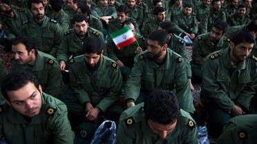 Members of the revolutionary guard attend the anniversary ceremony of Iran's Islamic Revolution at the Khomeini shrine in the Behesht Zahra cemetery, south of Tehran, Feb. 1, 2012. (Reuters)