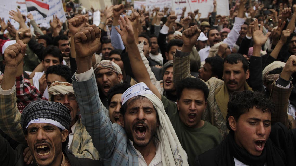 Anti-government protesters shout slogans during a demonstration marking the 3rd anniversary of the uprising that toppled Yemen's former president Ali Abdullah Saleh in Sanaa February 11, 2014. reuters