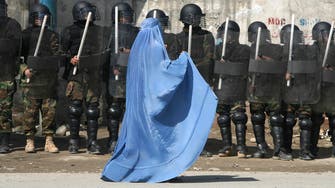 Burqa-clad men storm Afghan police HQ