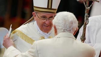 Benedict joins Francis in unprecedented ceremony