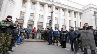 Ukrainian protesters claim control over capital