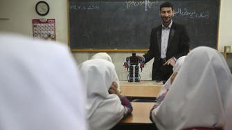 Iranian teacher builds robot to teach prayer