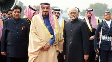 Crown Prince, Deputy Prime Minister and Minister of Defence Salman bin Abdulaziz Al Saud of the Kingdom of Saudi Arabia (C) poses for a photograph with Indian Vice-President Hamed Ansari (R) AFP