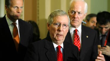 U.S. Senate Minority Leader Mitch McConnell (R-KY) (C) is flanked by Senator John Thune (R-SD) (L) and Senator John Cornyn (R-TX) (R) as he addresses reporters at the U.S. Capitol in Washington, February 4, 2014. (Reuters)