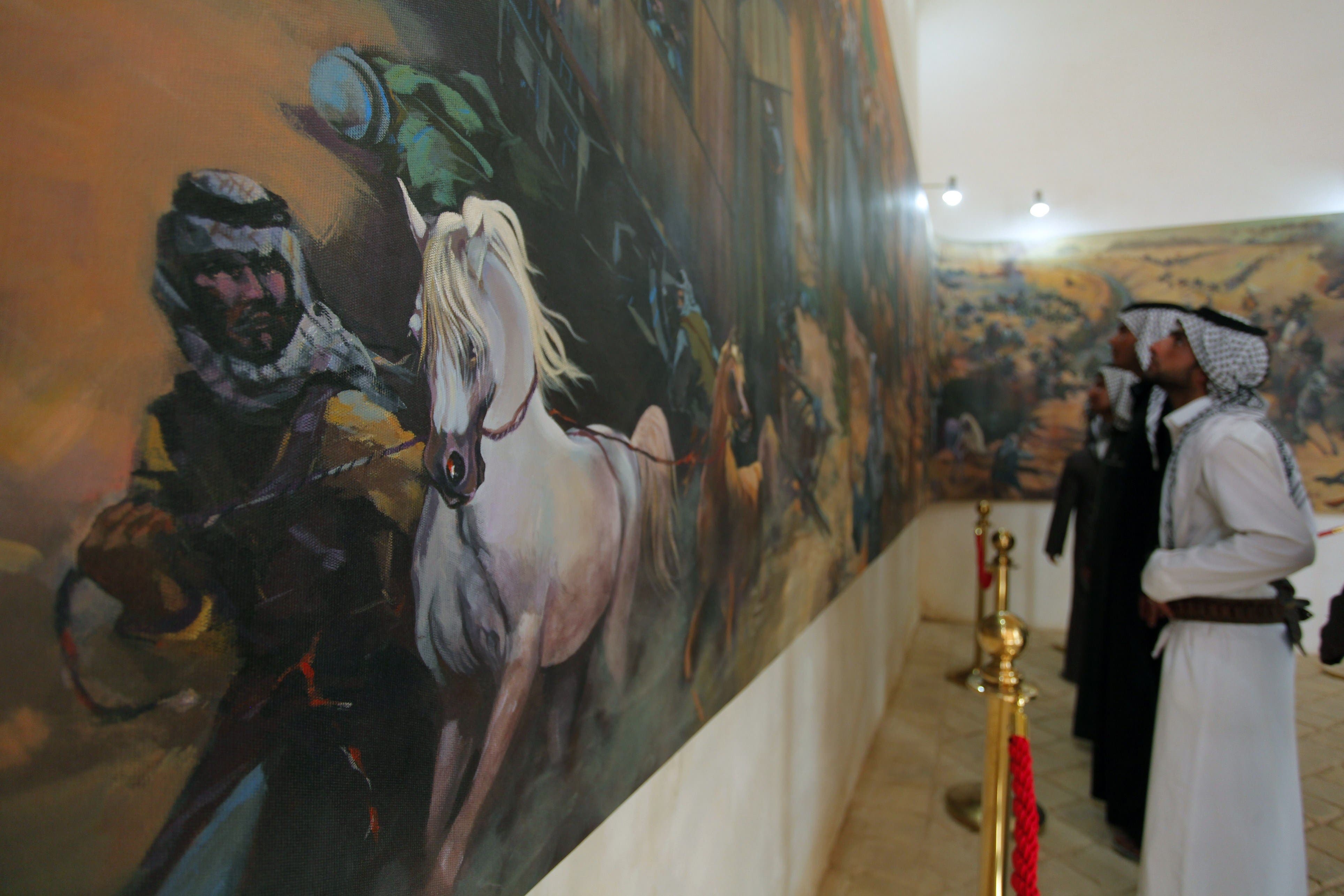  Iraqis visit the Najaf Heritage and 1920 Revolution Museum in the Khan al-Shilan building on February 27, 2014 in the holy city of Najaf, central Iraq. (AFP)