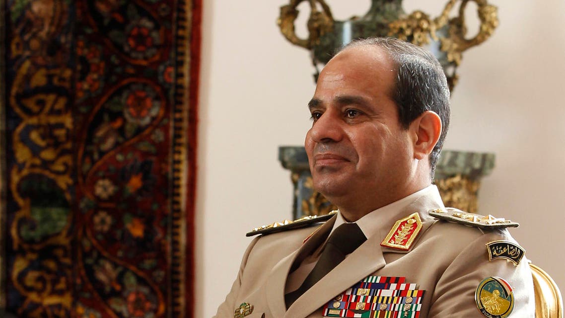 Egypt's Army Chief General Abdel Fattah al-Sisi attends a meeting with Egypt's interim President Adly Mansour