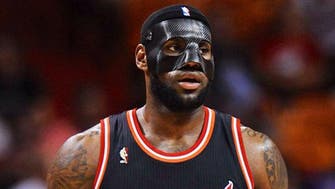 Basketball player LeBron James told to replace black mask 
