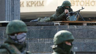 Russian troops fire at Ukraine military post