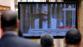 Egypt court postpones ruling on new judges in Mursi trials