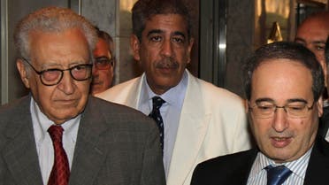 Syria's Deputy Foreign Minister Faisal Mekdad (R) speaks to reporters next to U.N.-Arab League peace envoy for Syria Lakhdar Brahimi (L) and Mokhtar Lamani, Brahimi's representative in Syria. (Reuters)
