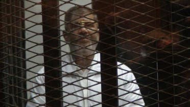 محمد مرسي خلف القضبان