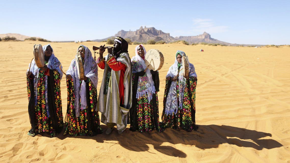 A Tuareg band performs folkloric songs in the desert during the 19th Ghat Festival of Culture and Tourism, in Ghat, about 1,360 km (845 miles) south of Tripoli reuters