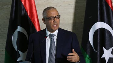 Libya's Prime Minister Ali Zeidan speaks during a press conference on March 8, 2014 in the capital, Tripoli. (AFP)