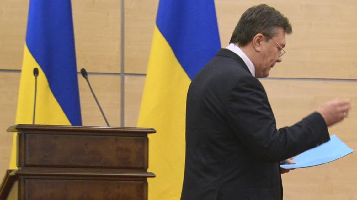 Deposed Ukrainian president Viktor Yanukovych walks as he attends his press-conference in southern Russian city of Rostov-on-Don, on March 11, 2014. (Reuters)