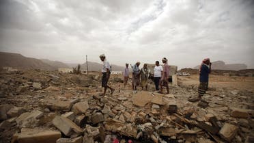 Tribesmen stand on the rubble of a building destroyed by a U.S. drone air strike. (File photo: Reuters)