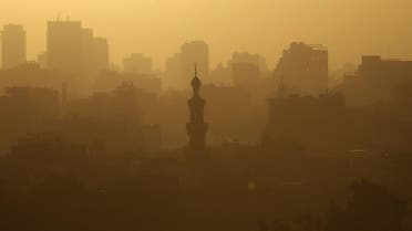 The sun sets over the minarets of mosques and houses amidst fog in the old town of Cairo on Sept. 4, 2013. (File photo: Reuters)