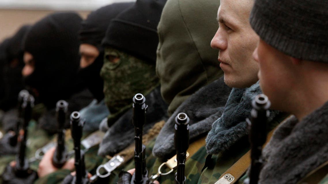 Members of a pro-Russian self defence unit stand in formation as they take an oath to Crimea government in Simferopol March 10, 2014. (Reuters)